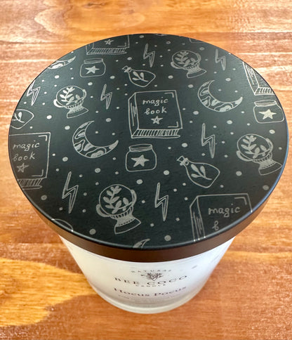 Hocus Pocus Candle lid engraved with spell books and potion bottles